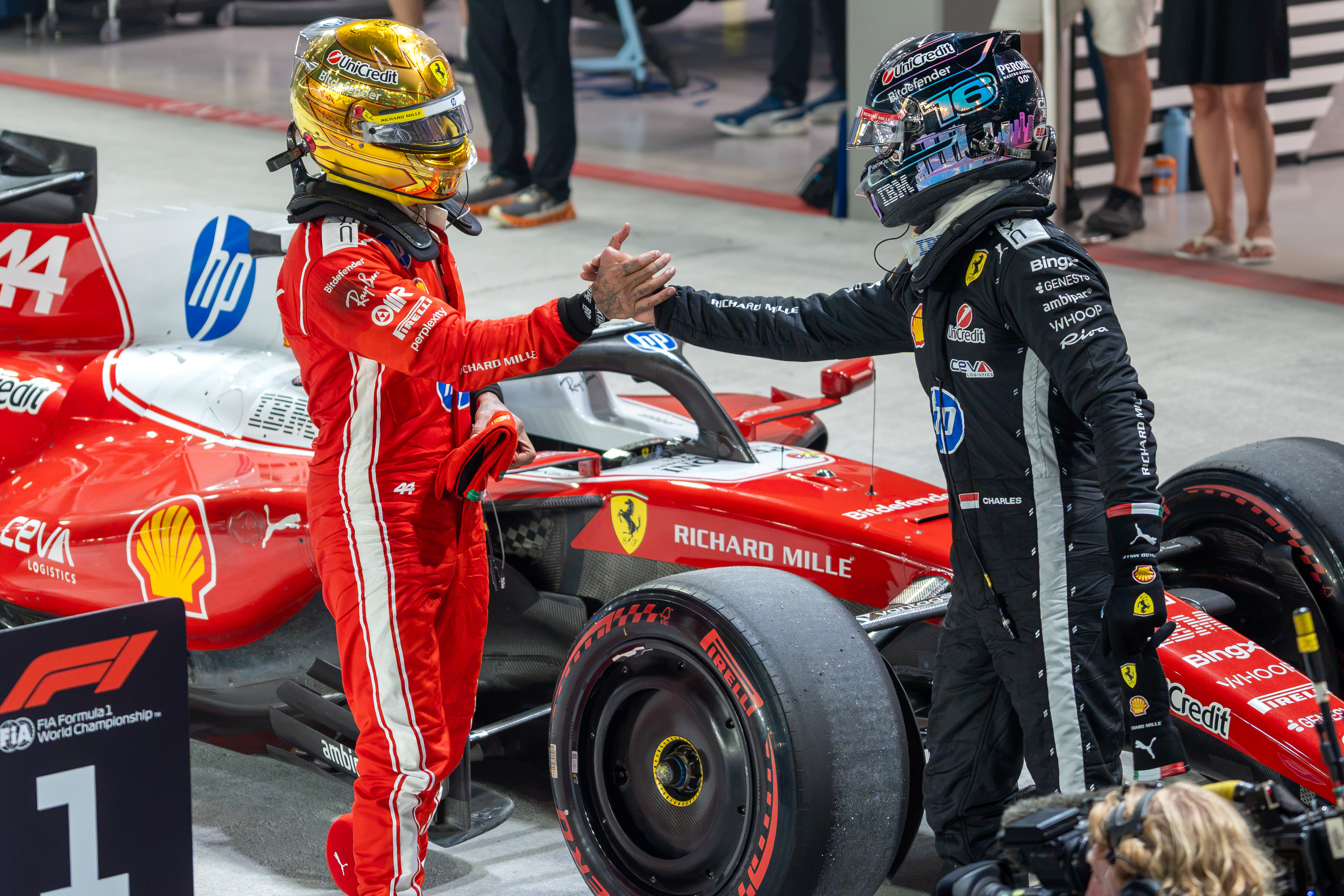 Formula 1 drivers Lewis Hamilton and Charles Leclerc of Ferrari at the Singapore Grand Prix in Marina Bay