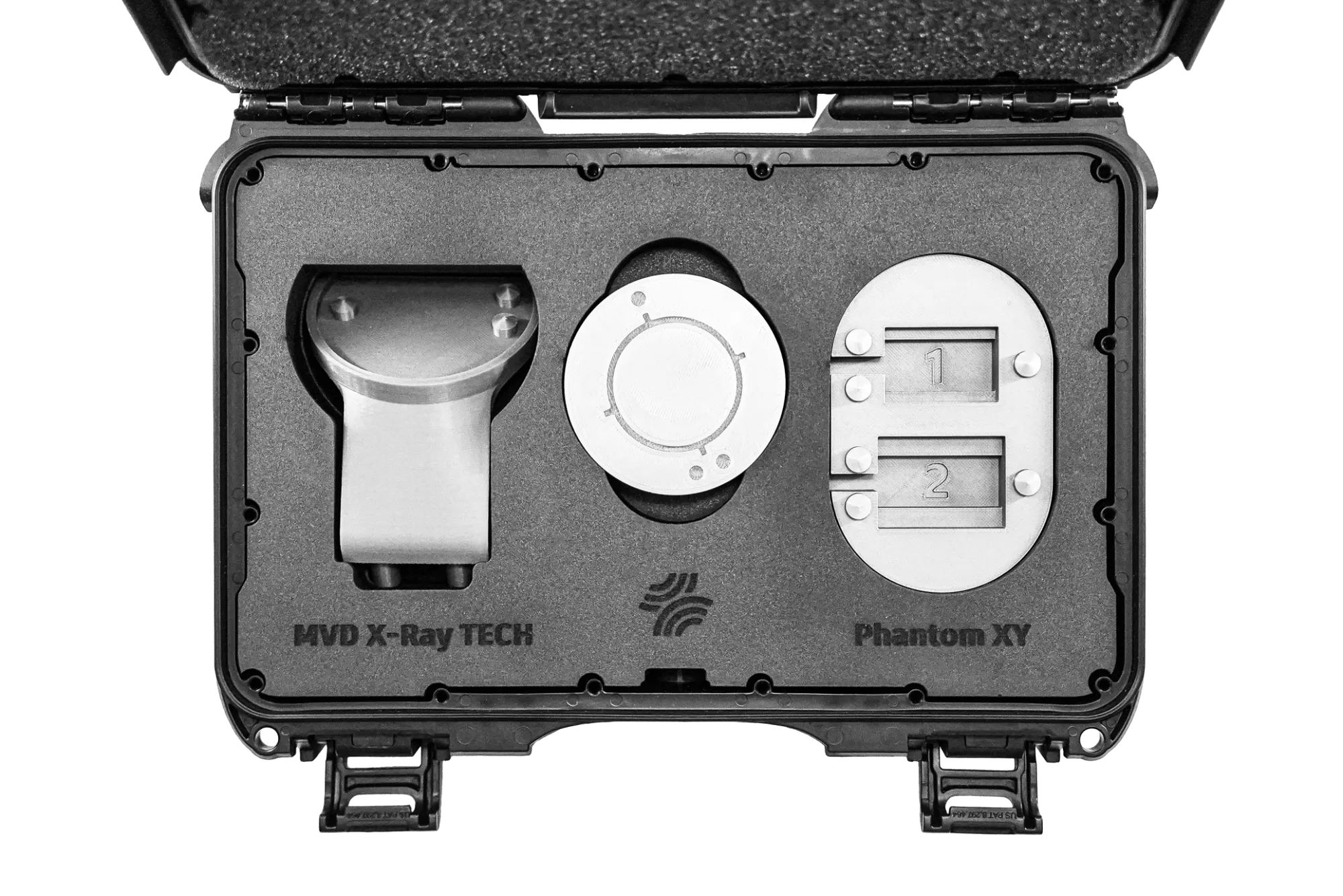 Open black protective case containing three precision metal components labeled MVD X-Ray TECH and Phantom XY.