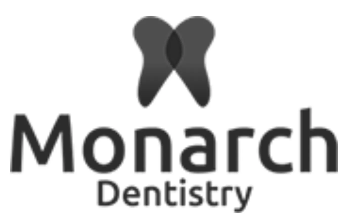 Logo of Monarch Dentistry in black and white.