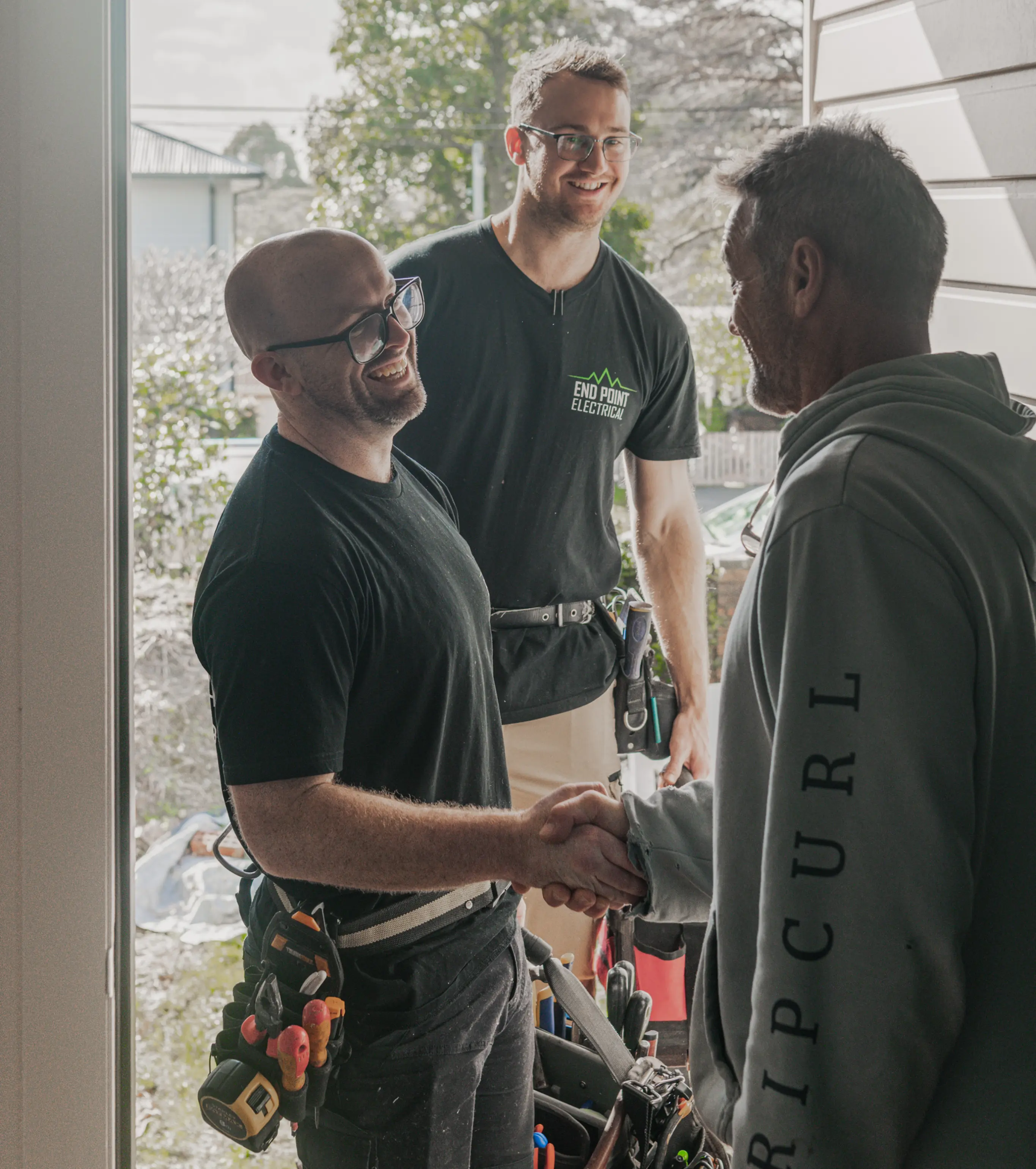 A man shaking another man's hand as a sign of trust