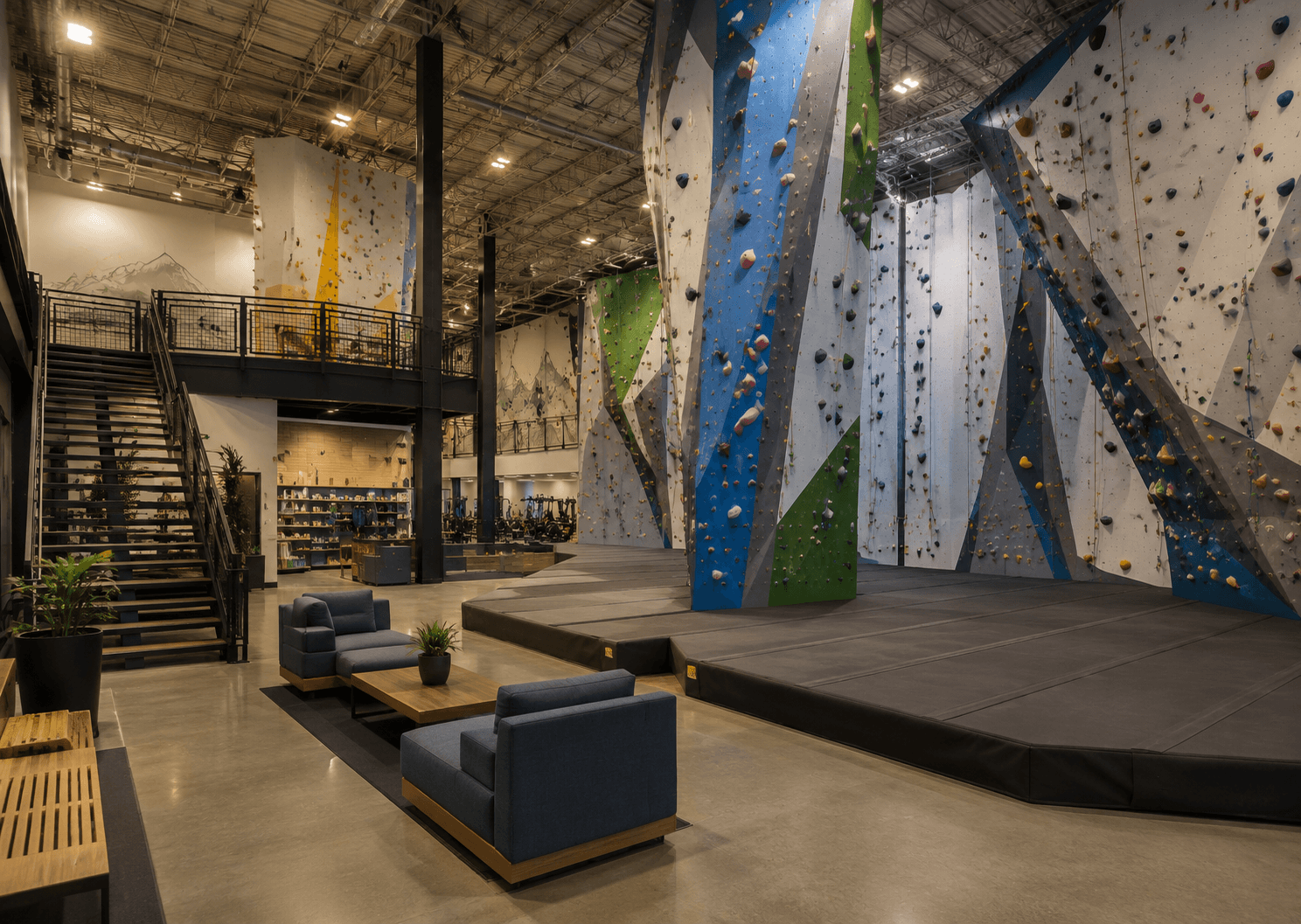 Modern indoor climbing gym with lounge