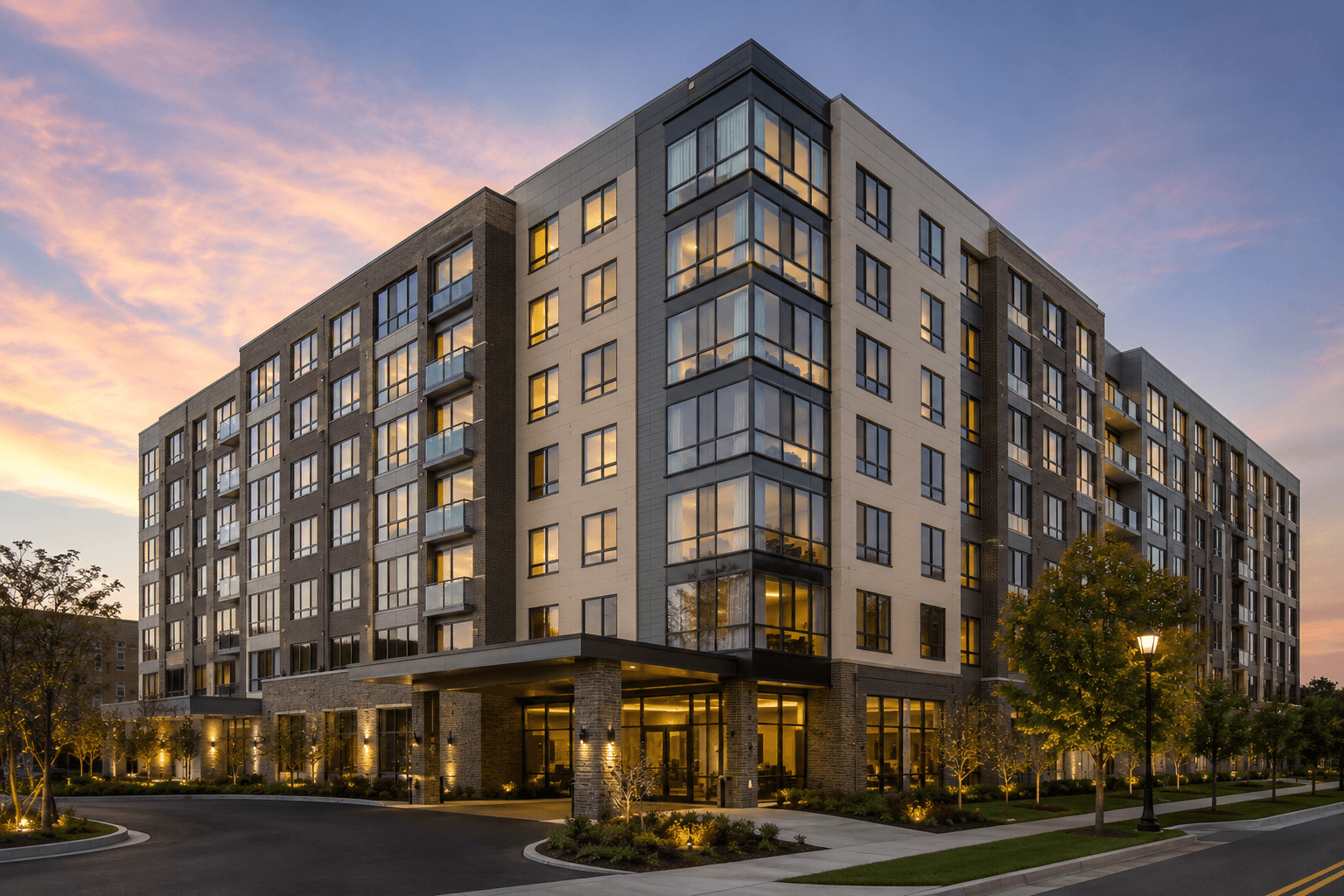 Modern apartment building at sunset