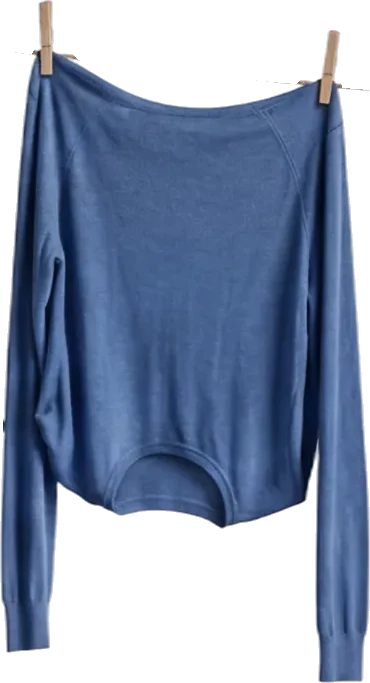 Blue long-sleeve sweater hanging on a clothesline with wooden clothespins.