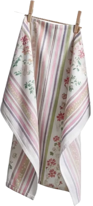 A white tea towel hanging on a clothesline with wooden clothespins, featuring vertical pink, gray, and green stripes and floral patterns in red, green, and beige.