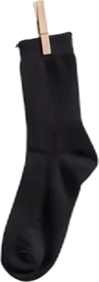 Single black sock hanging vertically on a wooden clothespin against a white background.