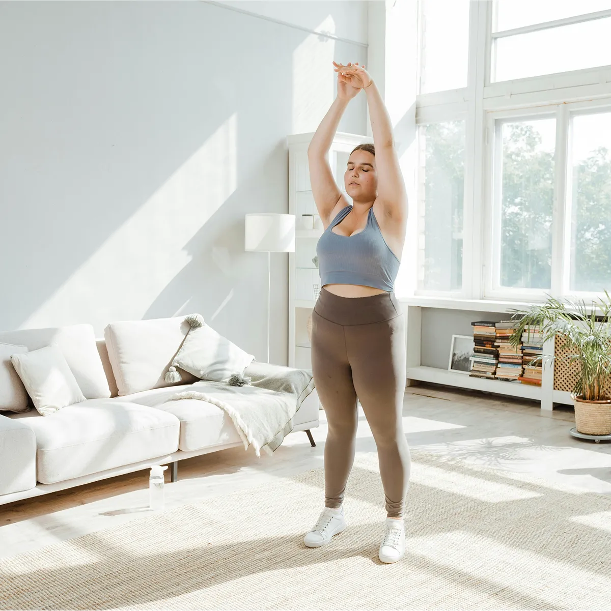 A woman stretching before working out