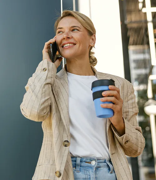 A woman on the go talking on her phone