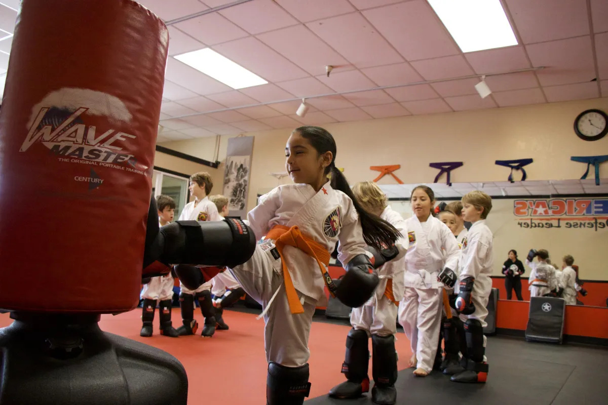 Imagery of the dojo and students practicing inside