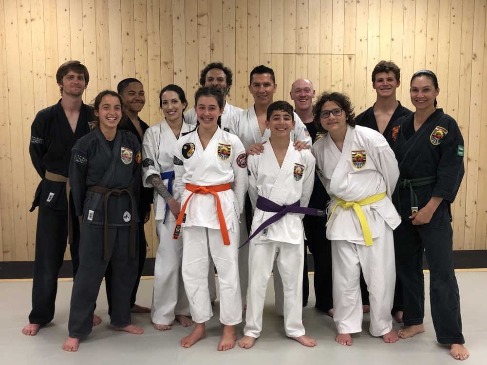 Imagery of the dojo and students practicing inside