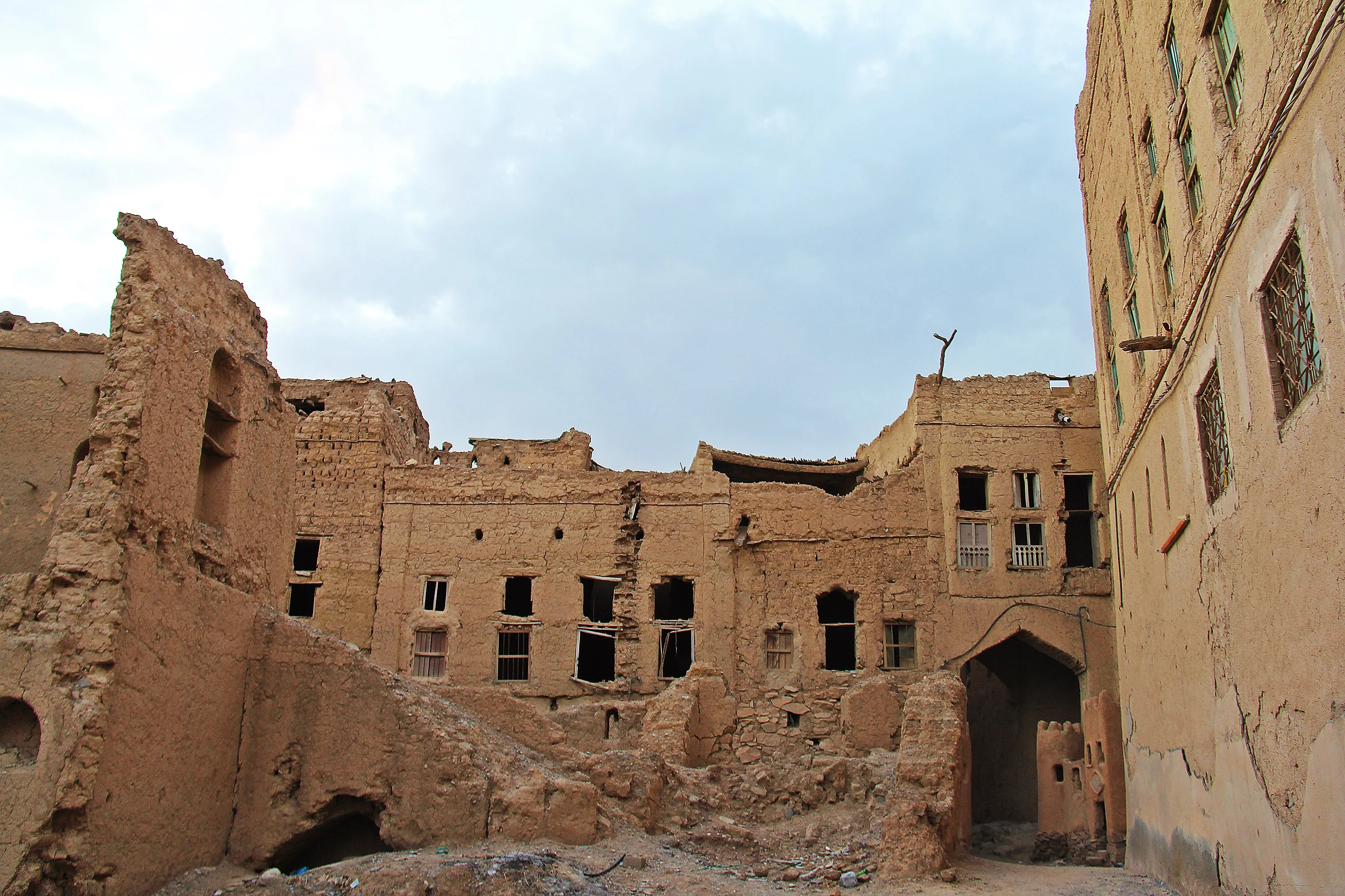 Old mudbrick buildings of Misfat Al Abriyeen explored on a cultural Oman tour.