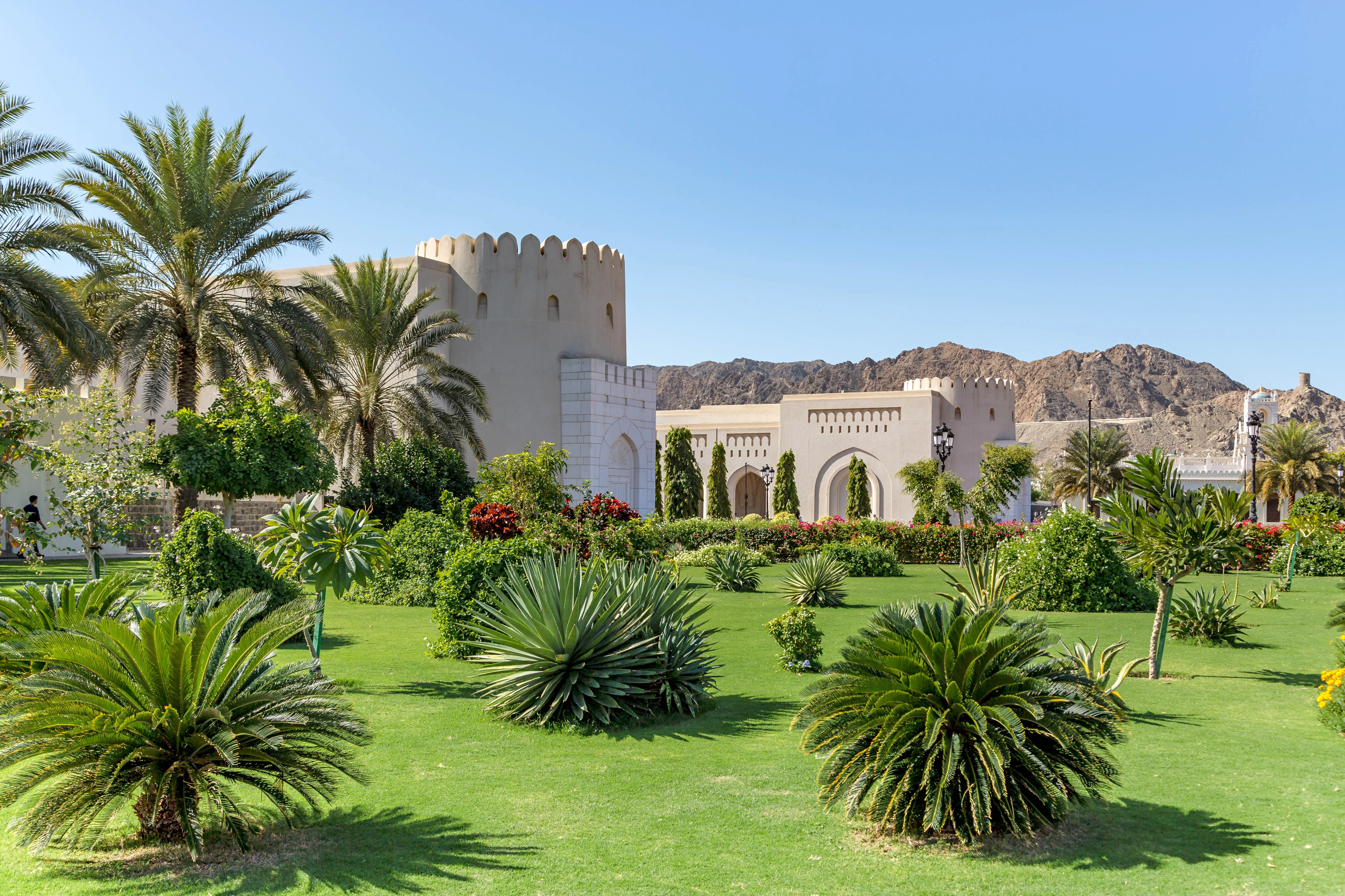 Garden view of Al Alam Palace in Muscat during a cultural Oman tour.