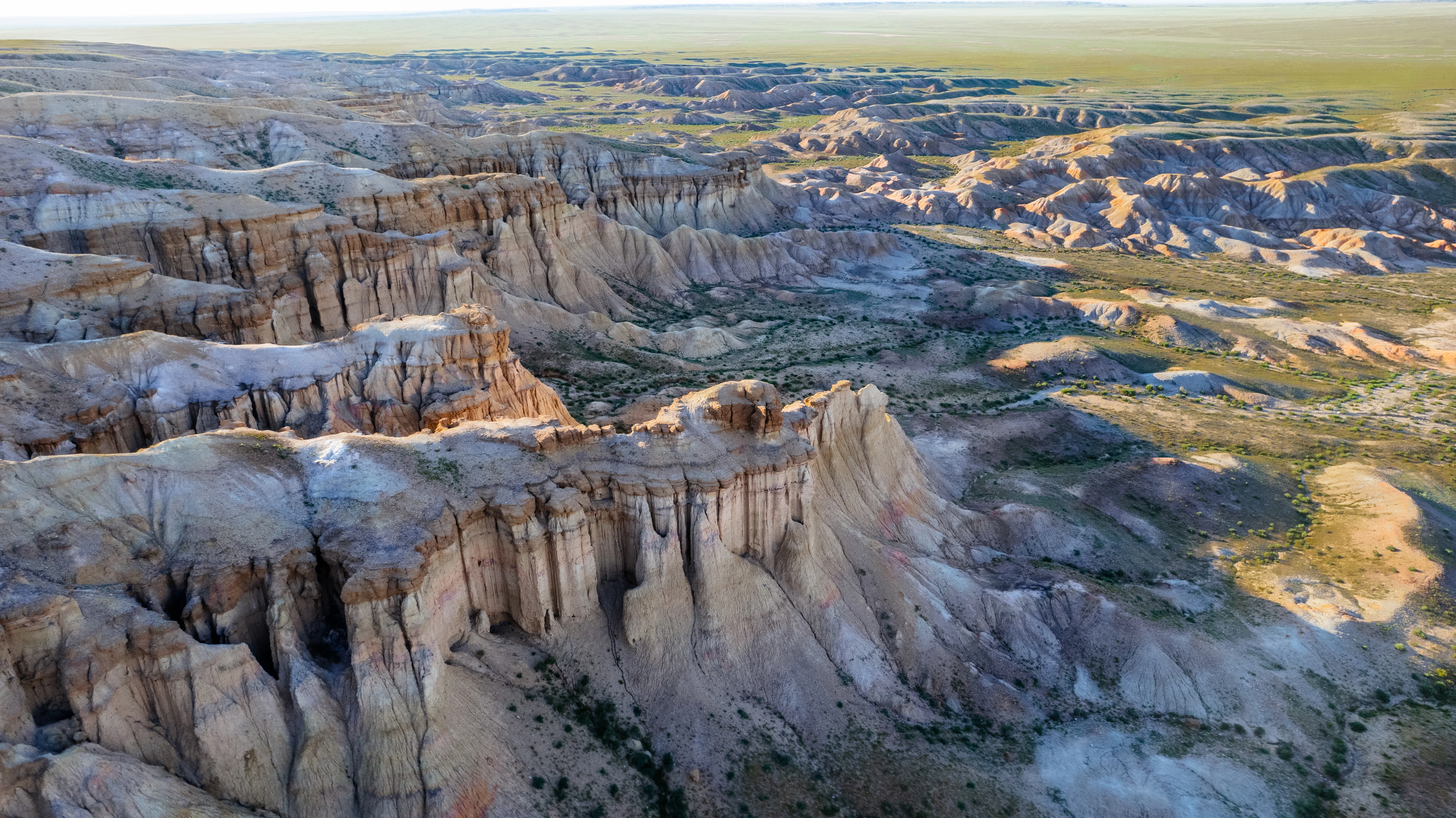 Eroded canyons and ridges of Mongolia's colorful Flaming Cliffs landscape.