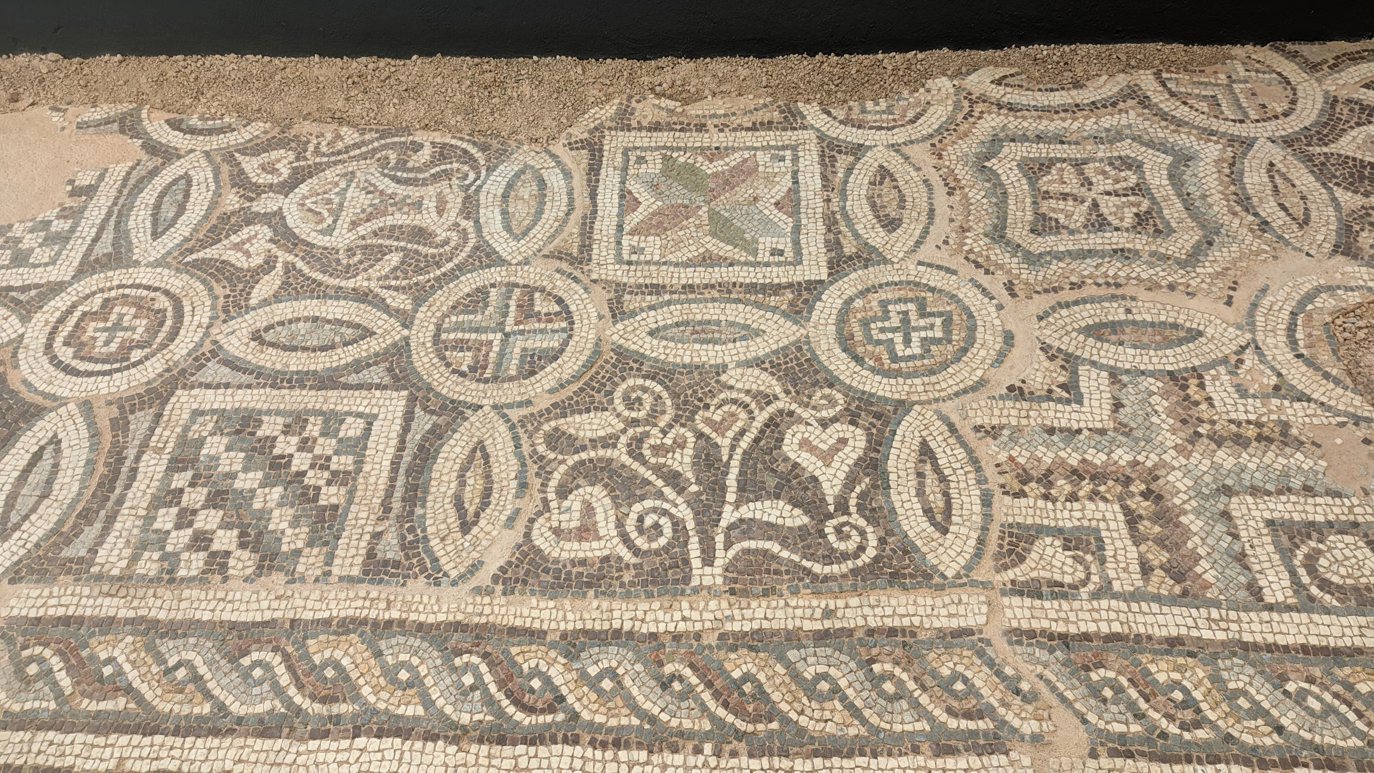 Ancient Roman mosaic floor with geometric and floral patterns in Plovdiv, Bulgaria.