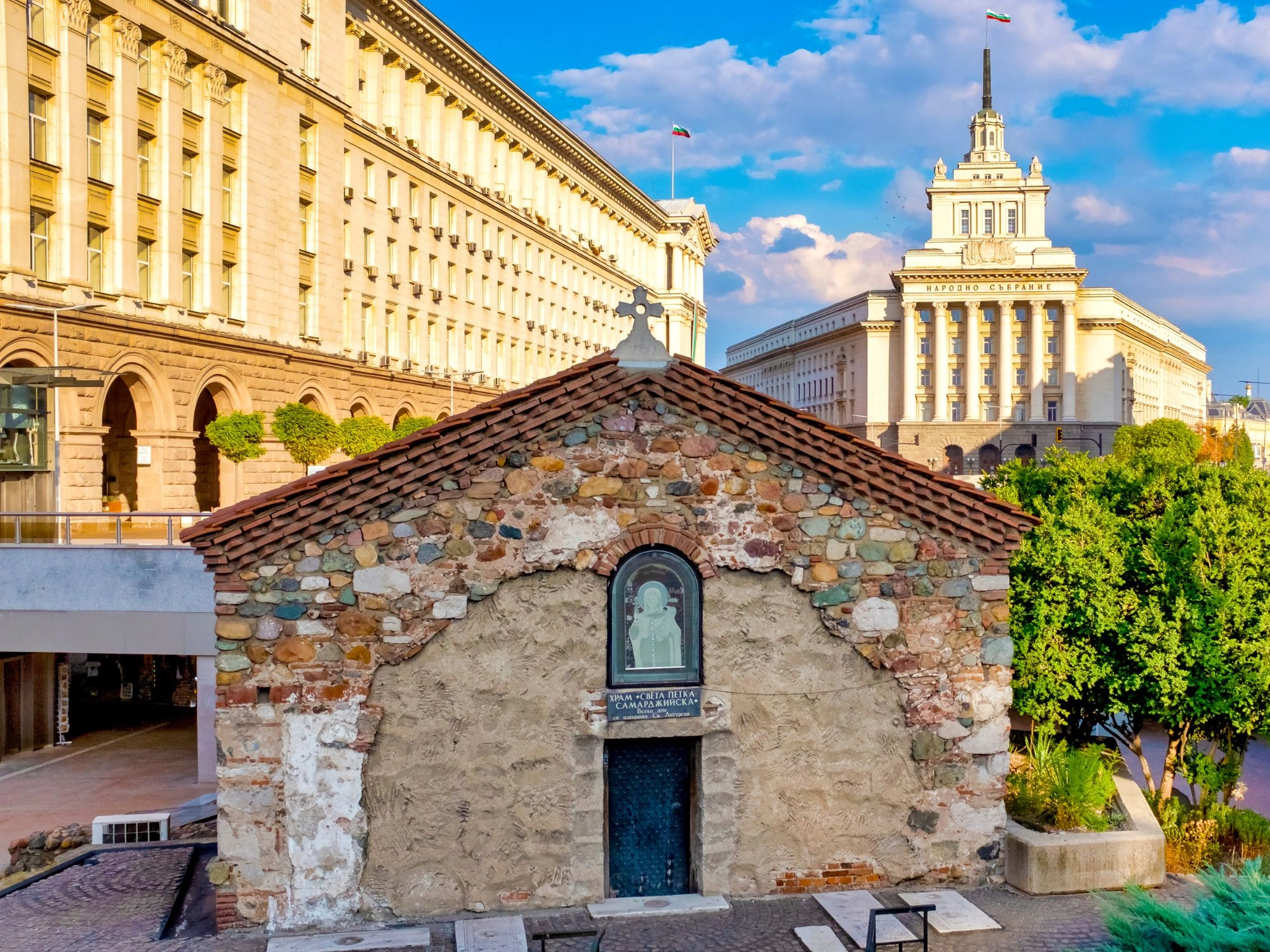 Ancient Rotunda in Sofia, Bulgaria - The St. George Rotunda, a historic red-brick church, surrounded by modern buildings in Sofia.
