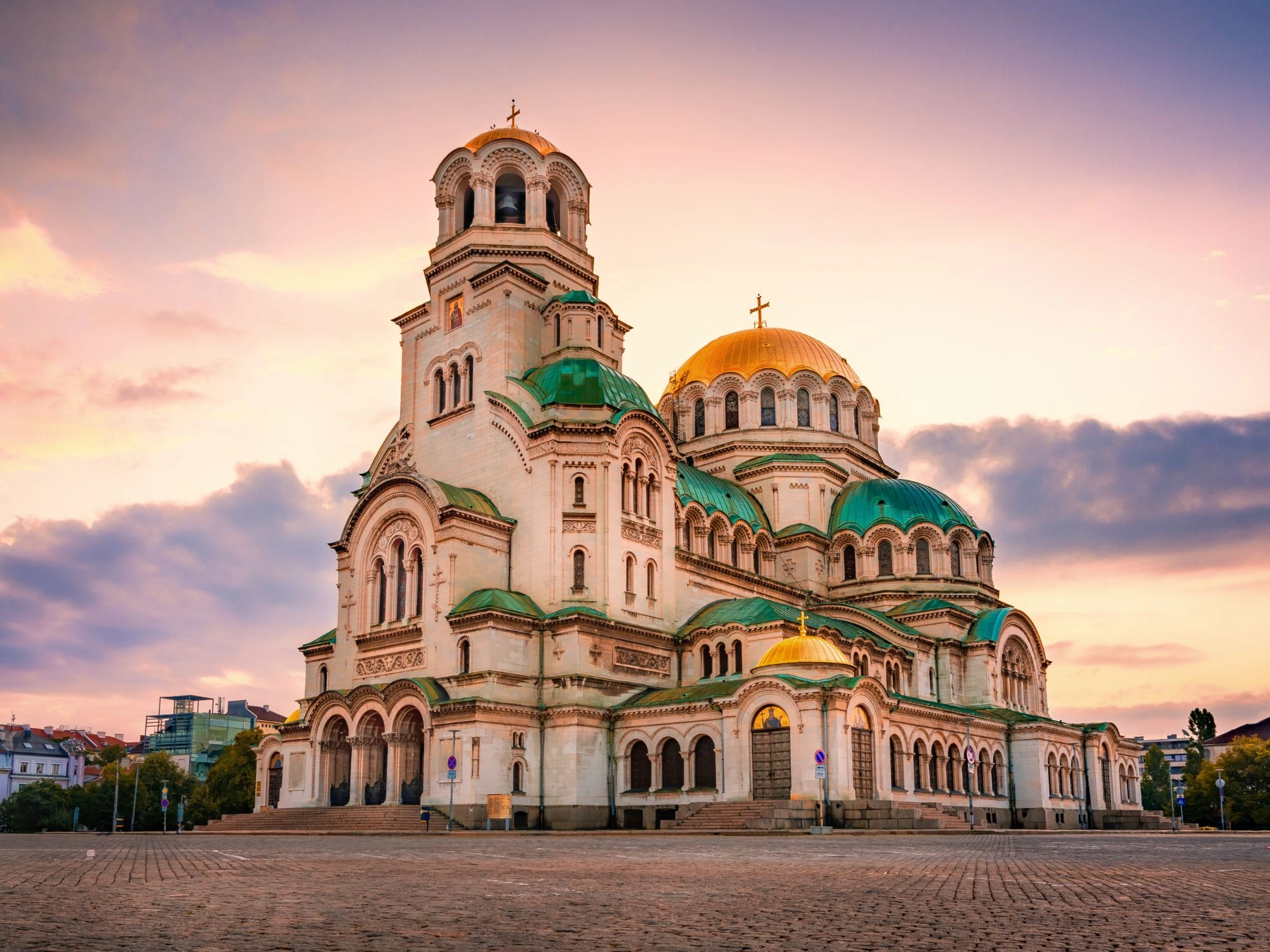 Alexander Nevsky Cathedral, Sofia, Bulgaria – grand domes and Orthodox architecture at sunset.