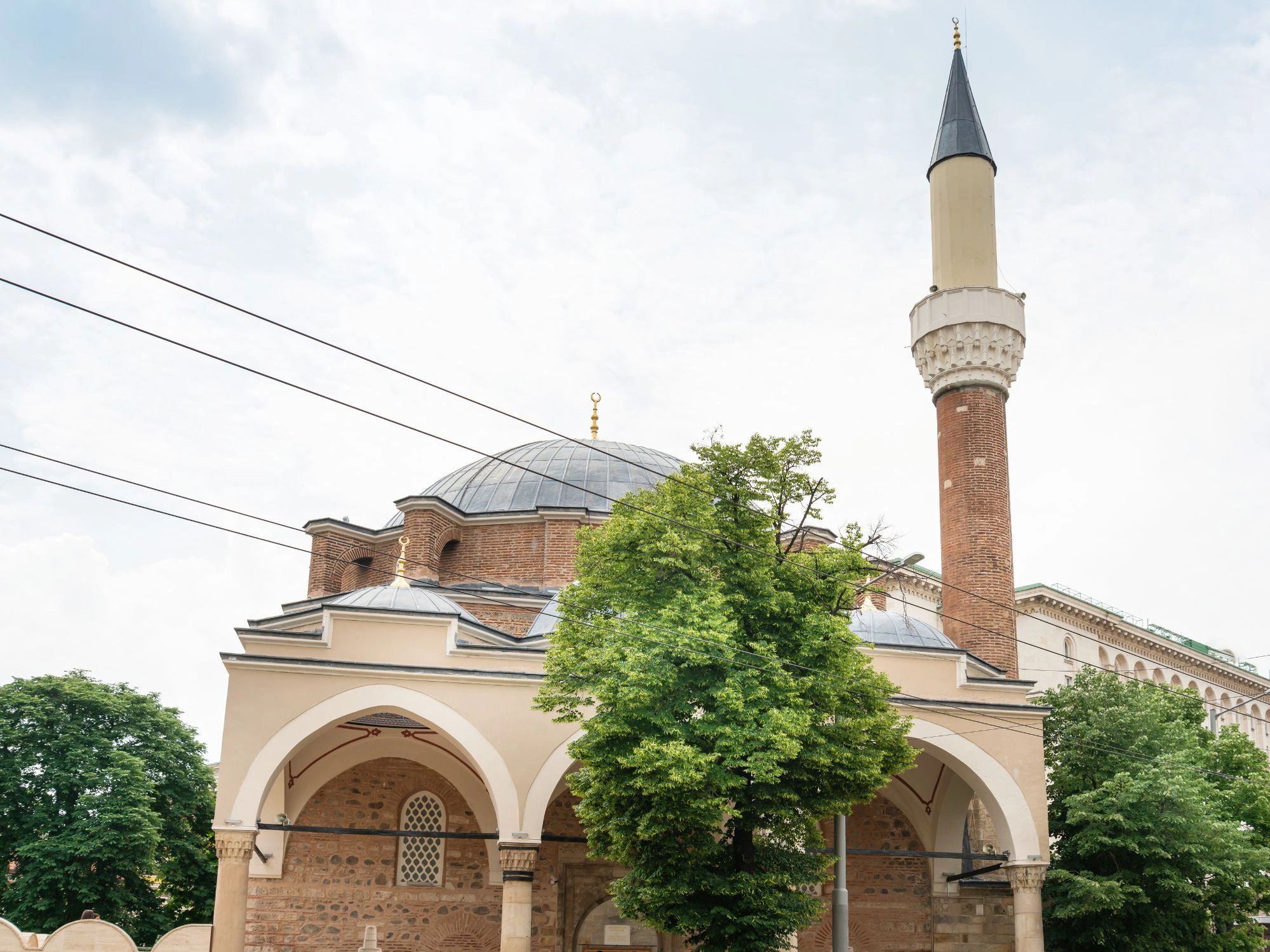 Banya Bashi Mosque minaret and domes in Sofia, Bulgaria historic Ottoman landmark