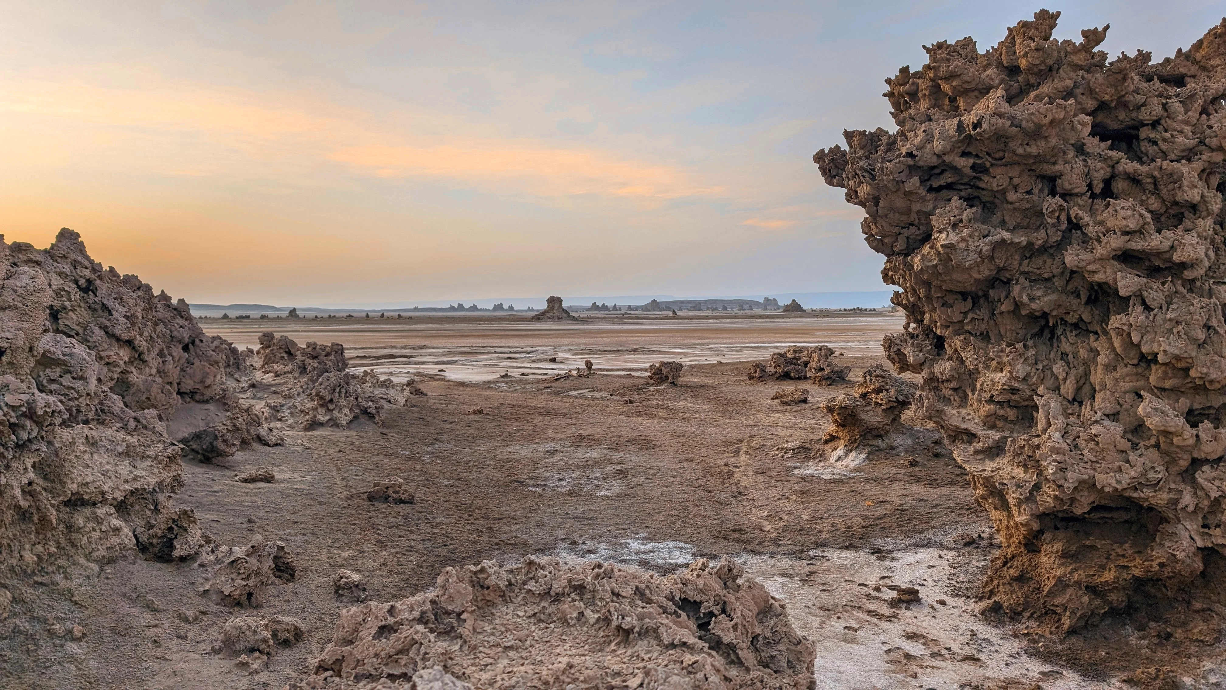 Alien-like rock formations at sunrise in Lake Abbe desert, Djibouti.