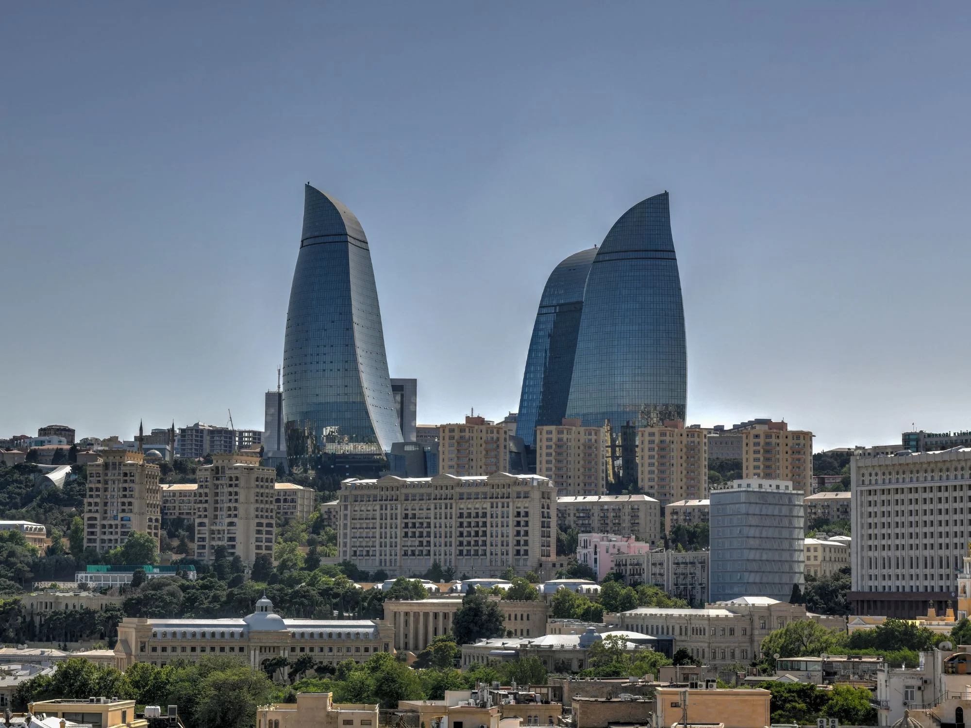 Baku's Flame Towers — flame-shaped glass skyscrapers rising above the city's older neighbourhoods