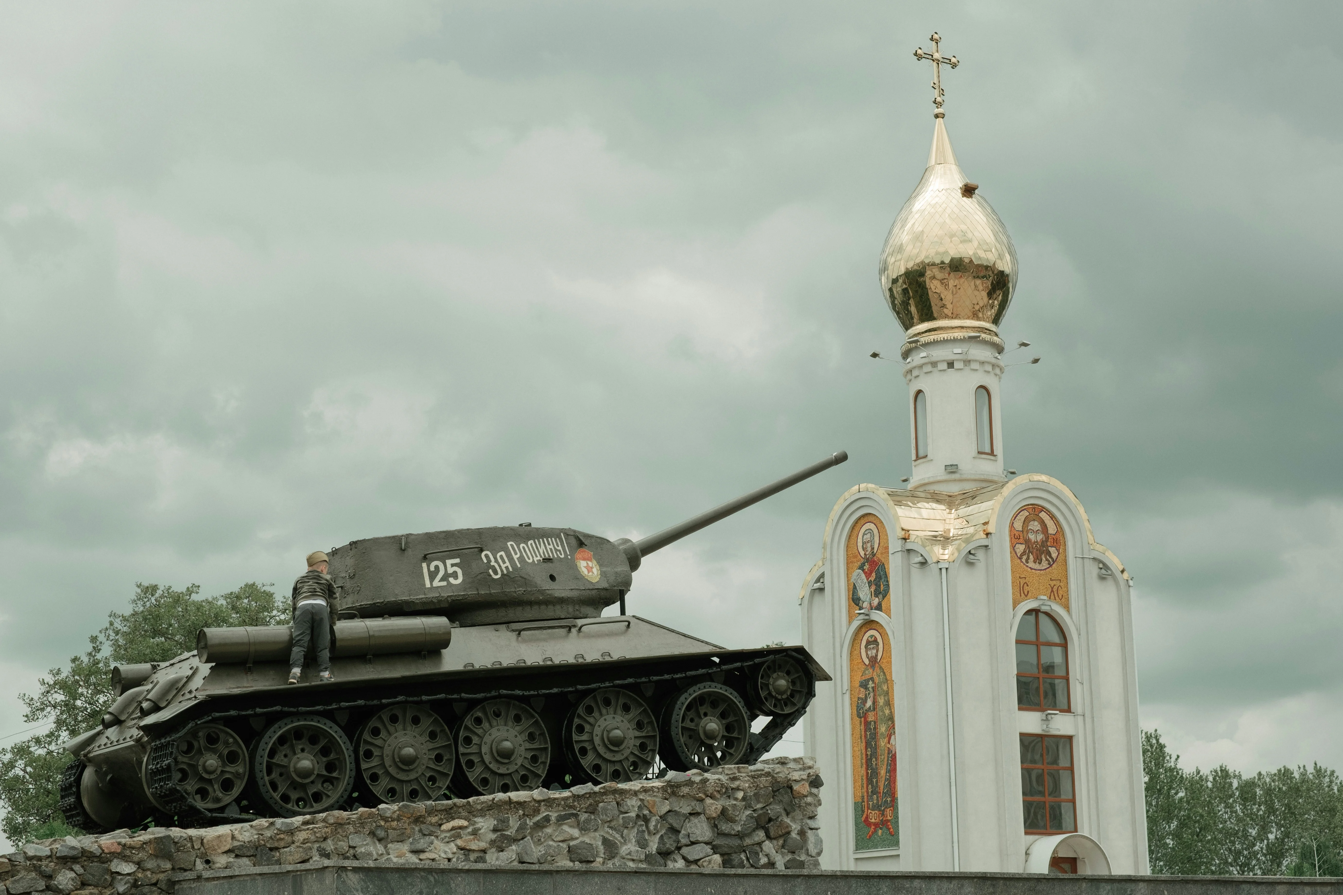 T-34 tank memorial beside a small golden-domed Orthodox chapel in Tiraspol, Transnistria