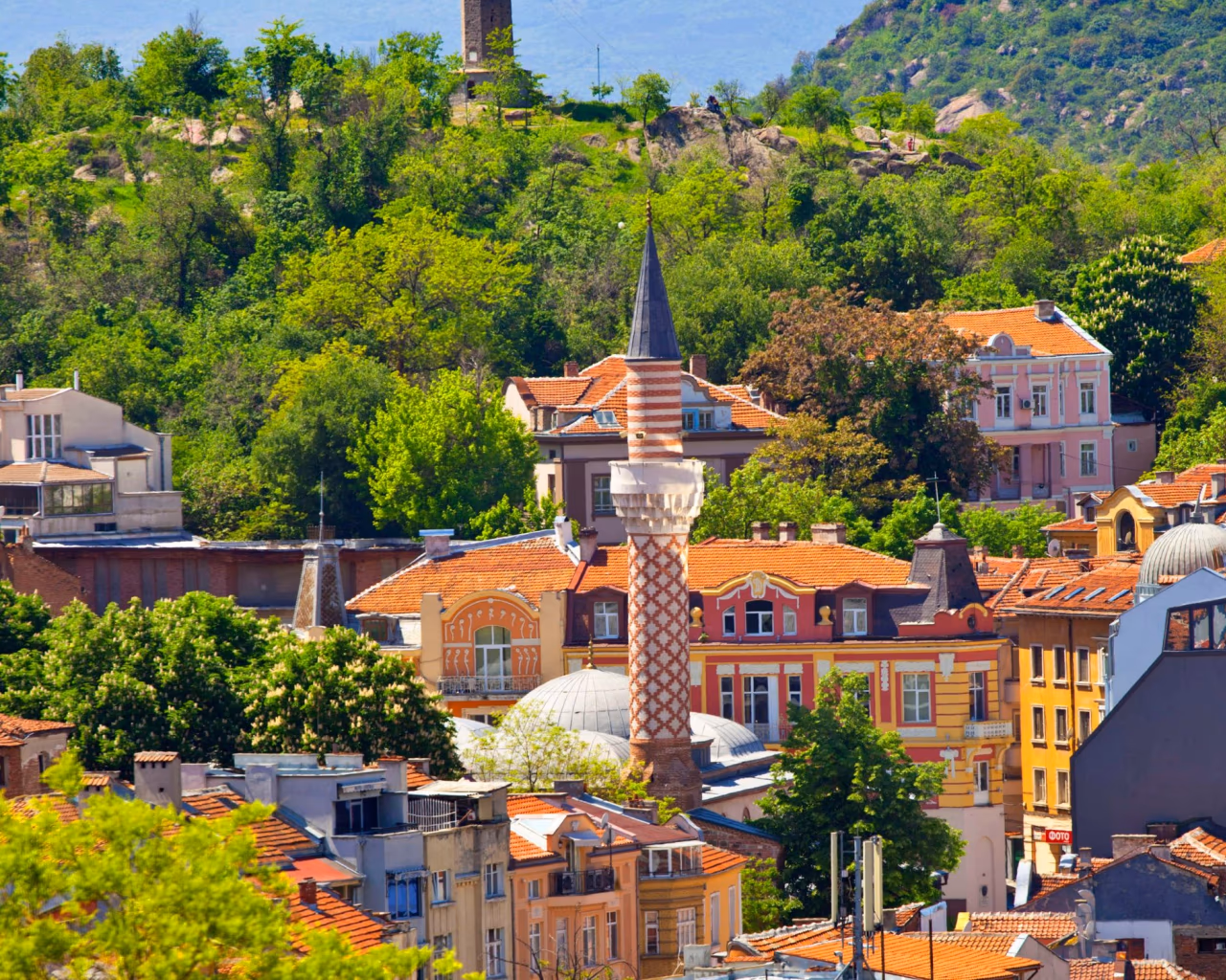 Plovdiv skyline with Dzhumaya Mosque minaret and old colorful houses, Bulgaria travel.