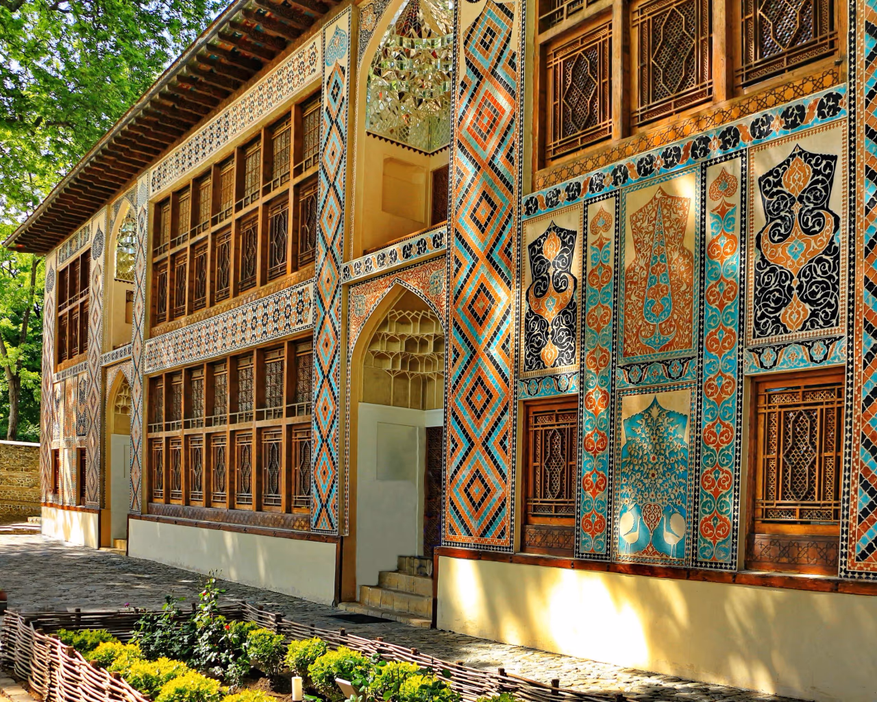 Sheki Khan’s Palace – ornate exterior of Sheki Khan’s Palace in Azerbaijan featuring intricate stained glass and colorful mosaics.