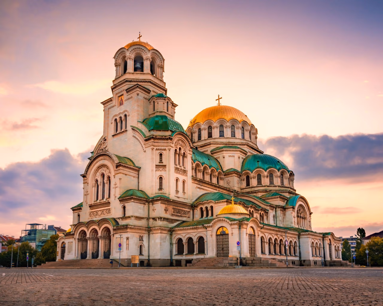 Alexander Nevsky Cathedral, Sofia, Bulgaria – grand domes and Orthodox architecture at sunset.