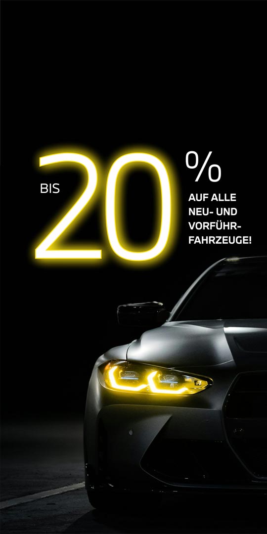 Frontansicht eines BMW mit gelb leuchtenden Scheinwerfern vor schwarzem Hintergrund mit Hinweis auf Black Weeks Rabattaktion – BMW Wolter & Steiner in Neubrandenburg, Waren und Prenzlau