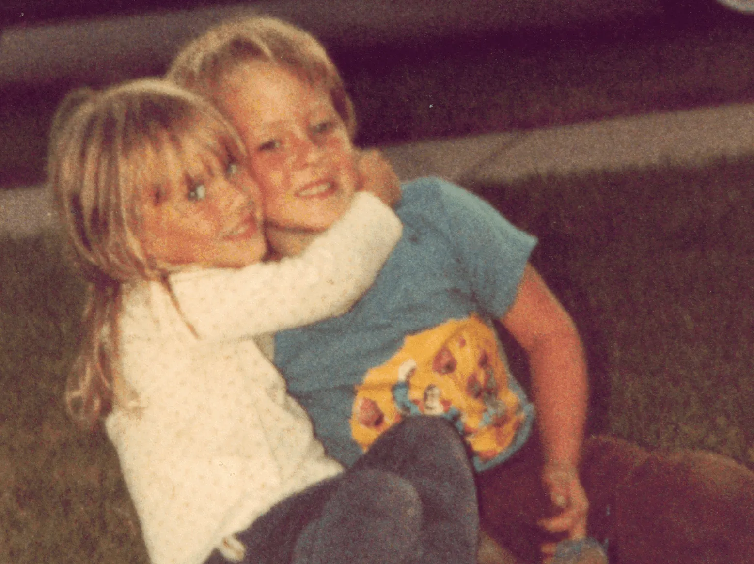 Two children from the Always Ready Repair family in a vintage photograph