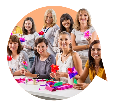 Girls posing for the picture with an orange speech bubble background.