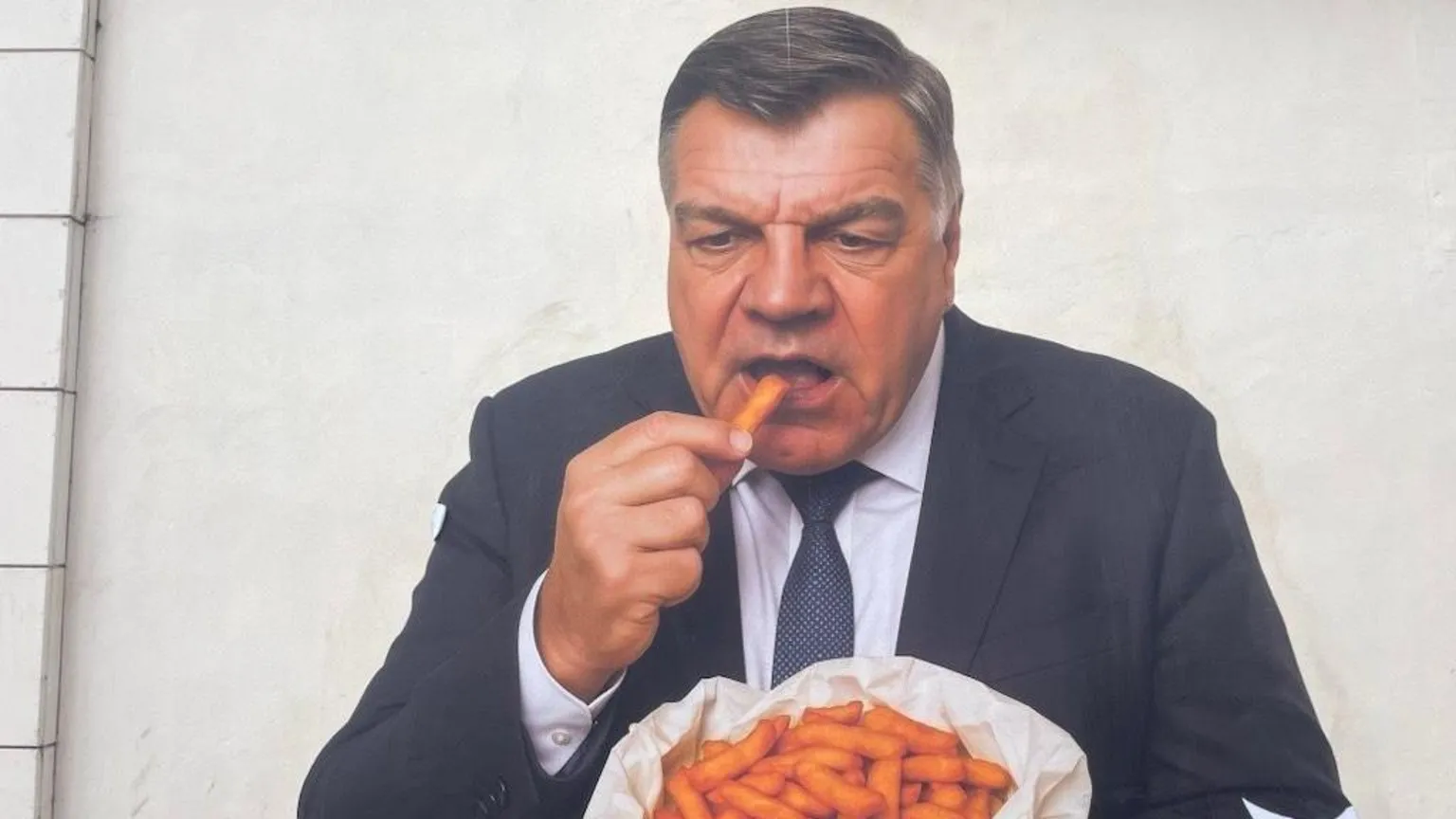Mysterious Mural of Sam Allardyce Eating Orange Chips Appears in Dudley