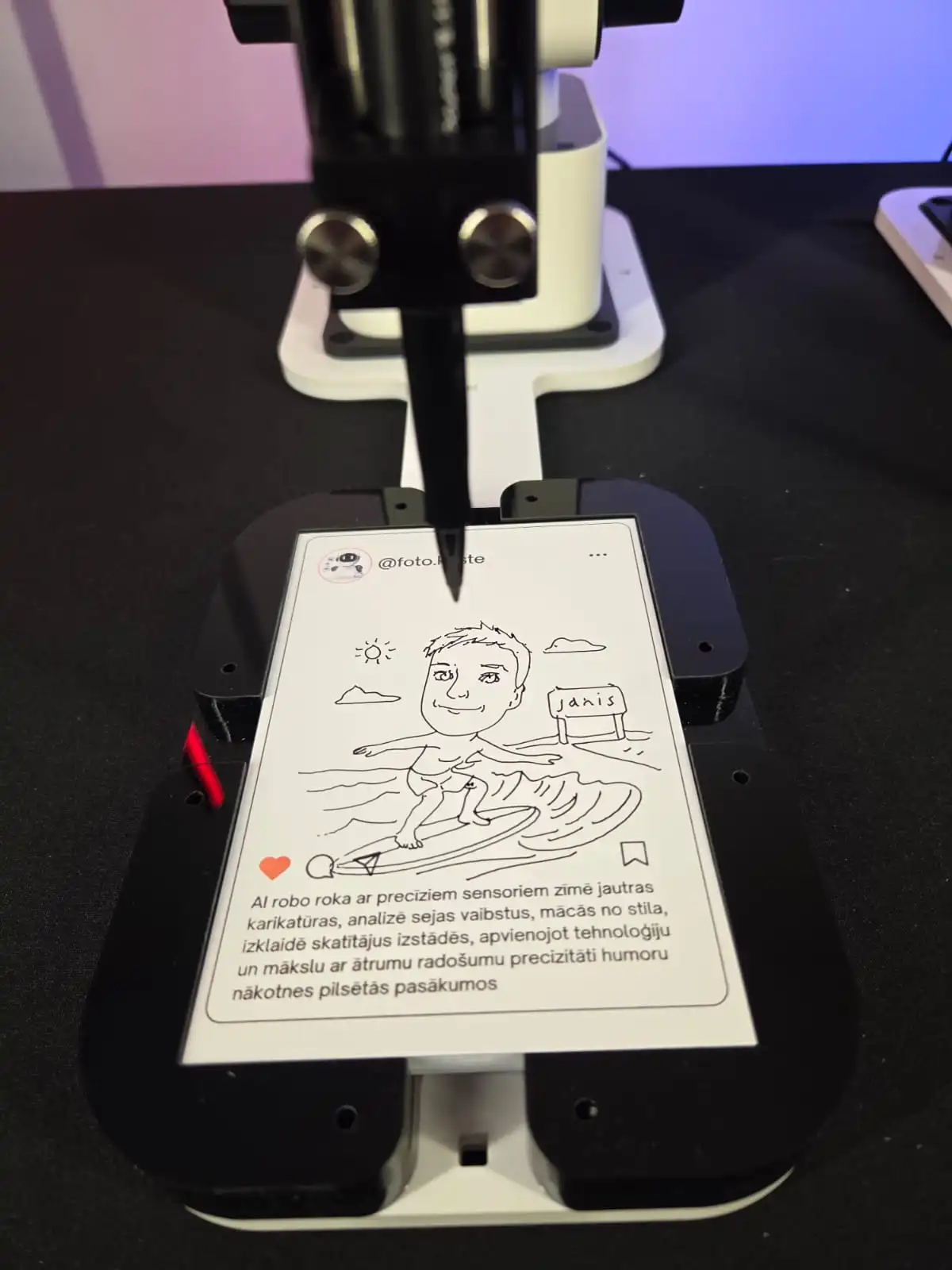AI drawing robot creating a caricature of a person surfing on a beach with a sign that says 'janis'.