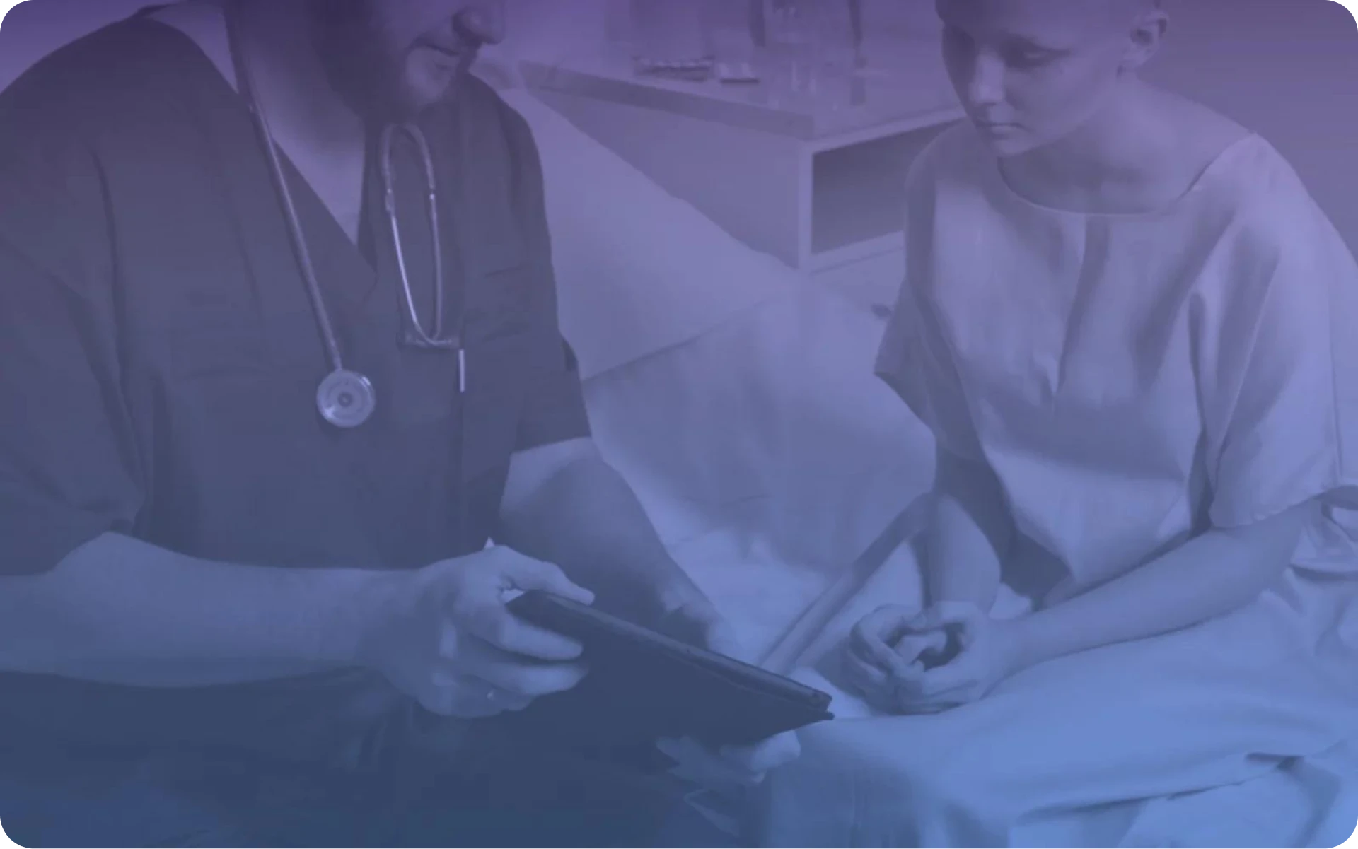 Medical professionals reviewing tablet data