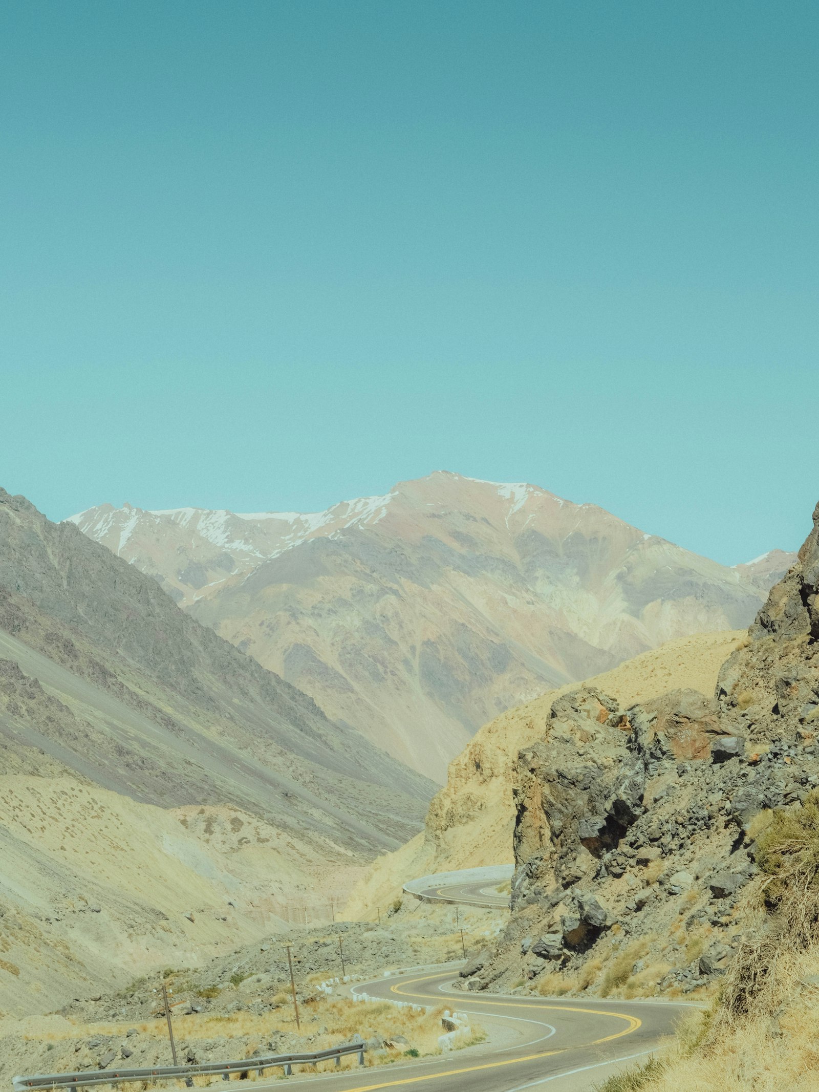 Winding mountain road through Hatta's rocky terrain