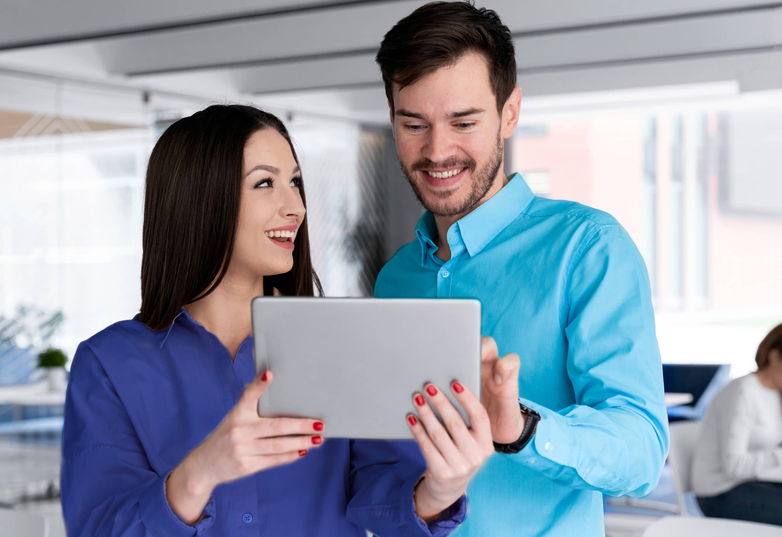 Couple Looking at a Tablet - Saasfy X Webflow Template

