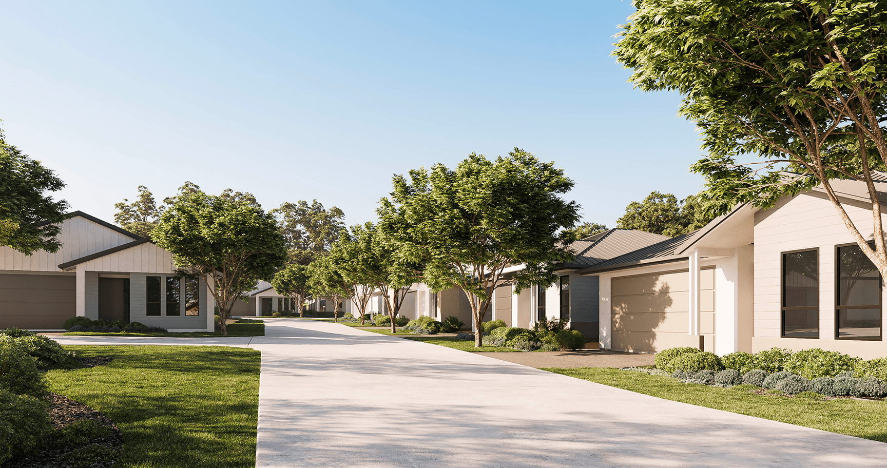 Residential street lined with modern single-story houses and evenly spaced green trees under a clear blue sky.