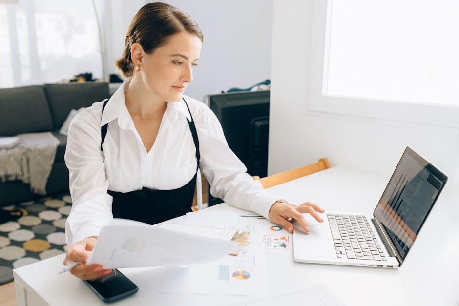 Direct-to-consumer brand owner analyzing financial reports - ecommerce accounting services