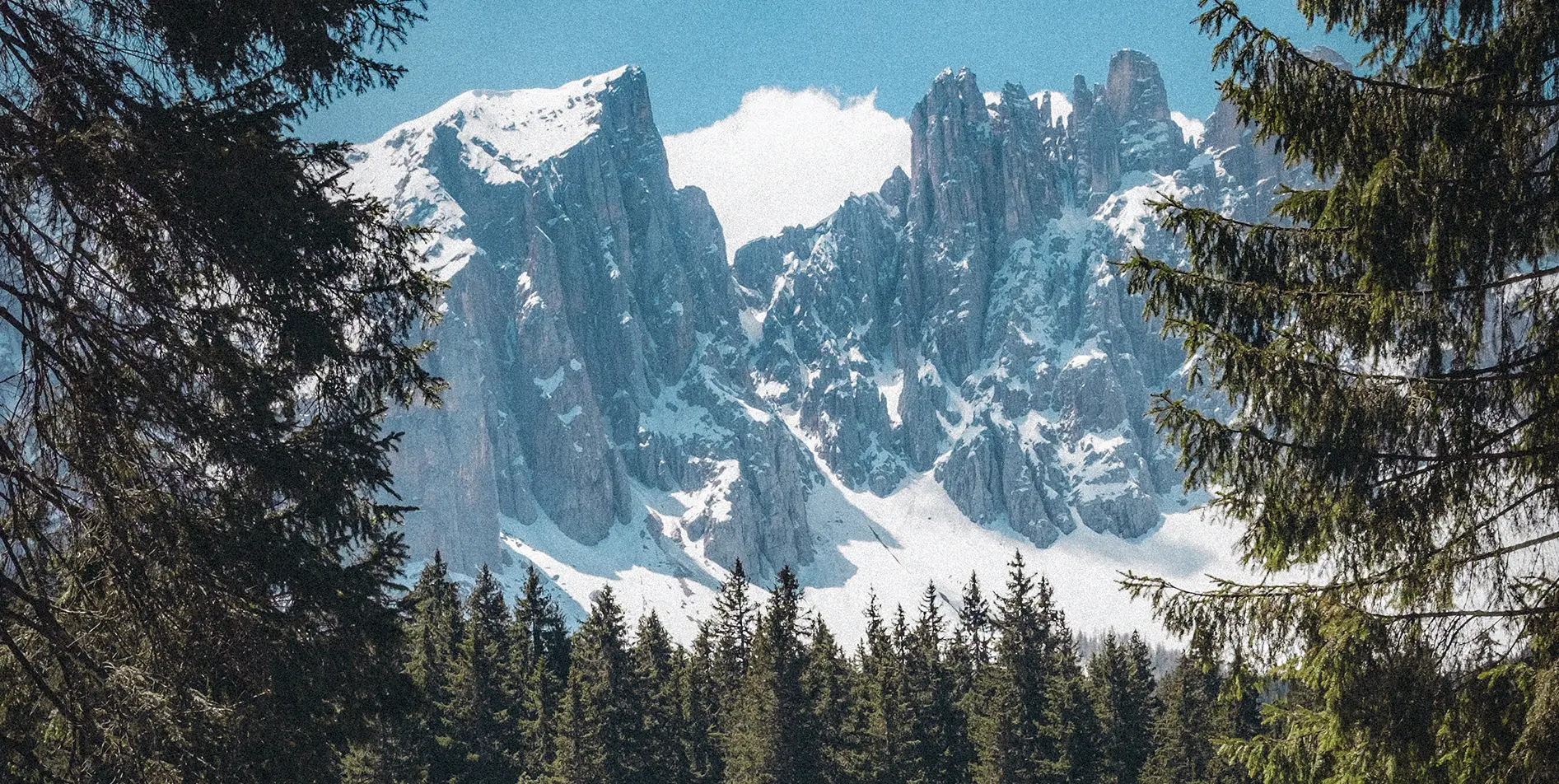 Panoramic view of the Swiss Alpine peaks from a temporary SNUUG structure.