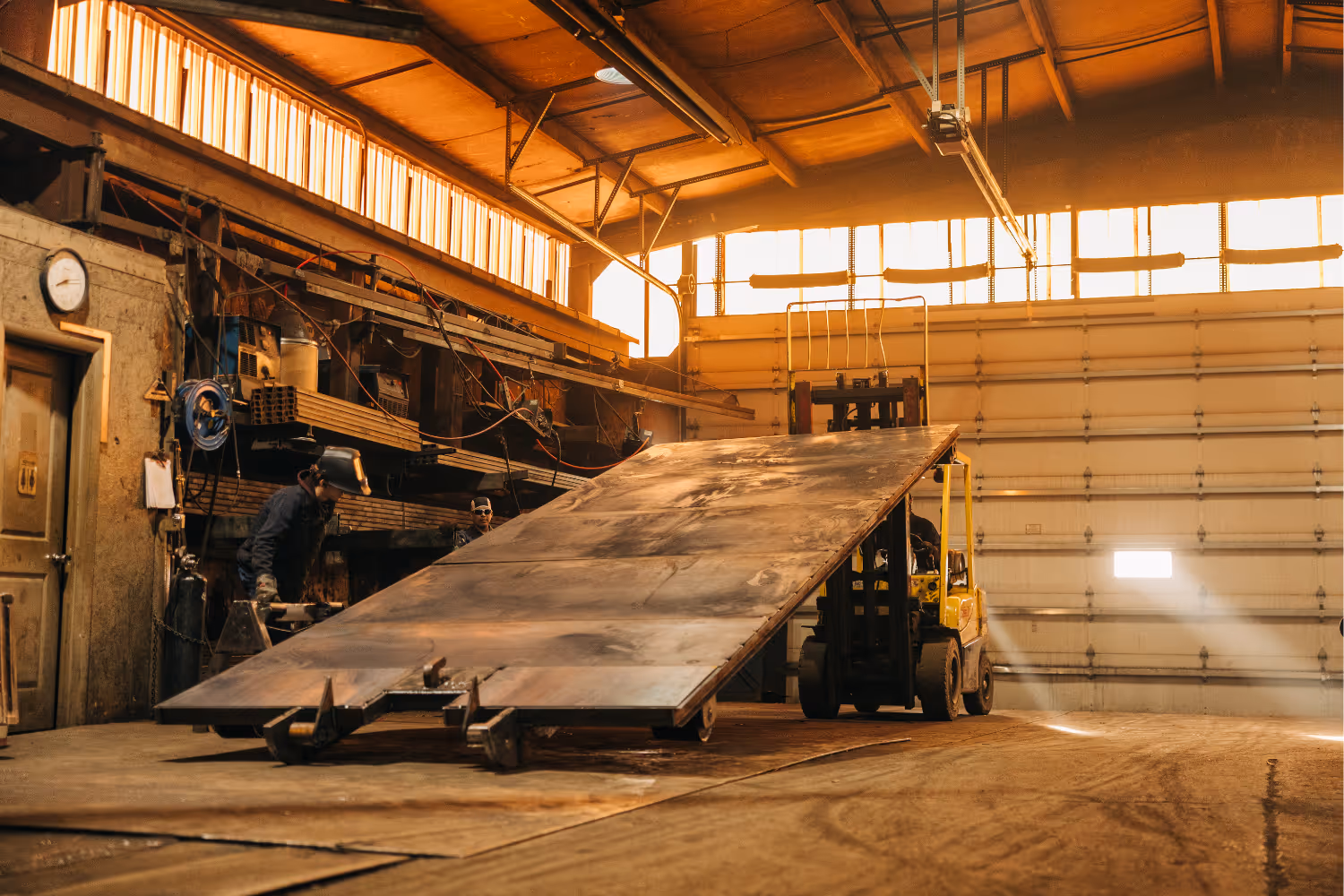 Roll-off container floor being lifted by a forklift