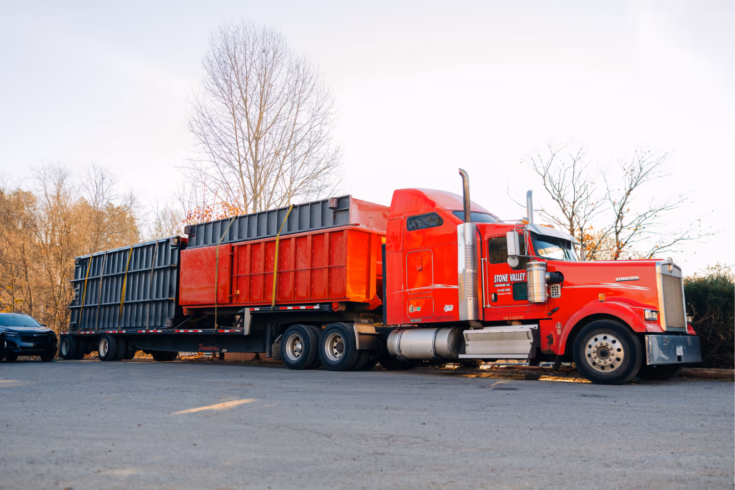Stone Valley Container semi with a load of roll-off containers