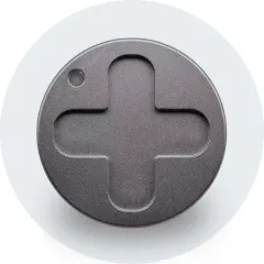 A round button with a cross on it