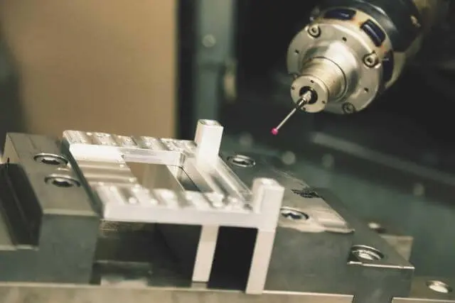 A machine that is working on a piece of metal