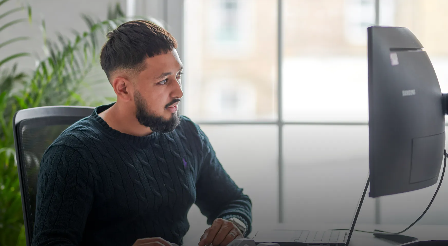 men looking at a computer
