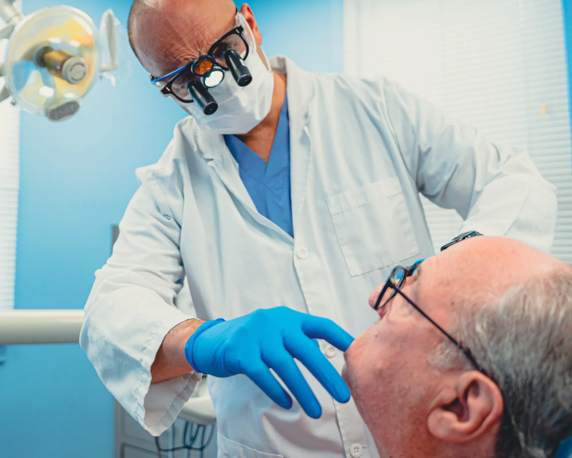 Dr. Cherian checking patient