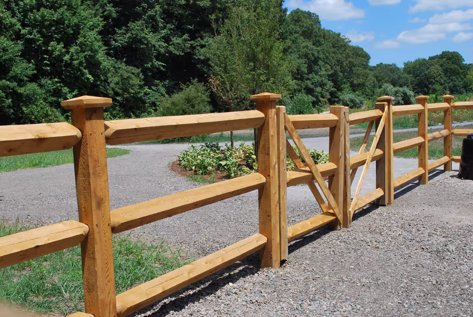 Outdoor deck with dining furniture overlooking a backyard pool and pergola.