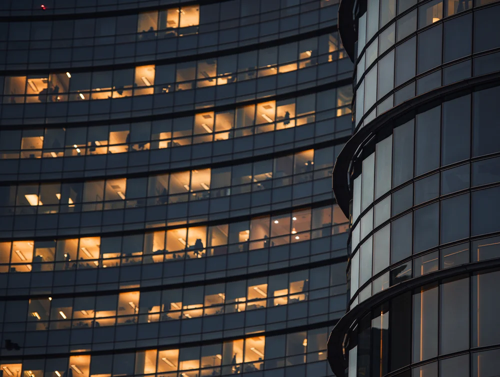 Corporate building at night.