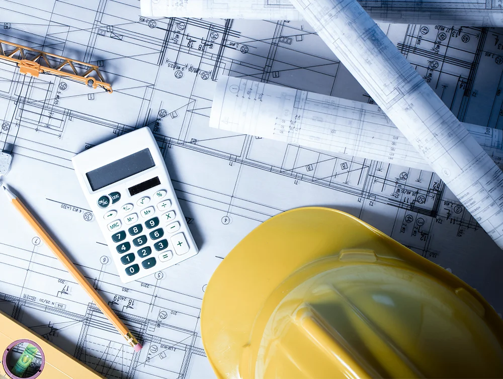 Construction concept. Construction theme, level, ruler, calculator, blueprints rolls, hard hat and pencil