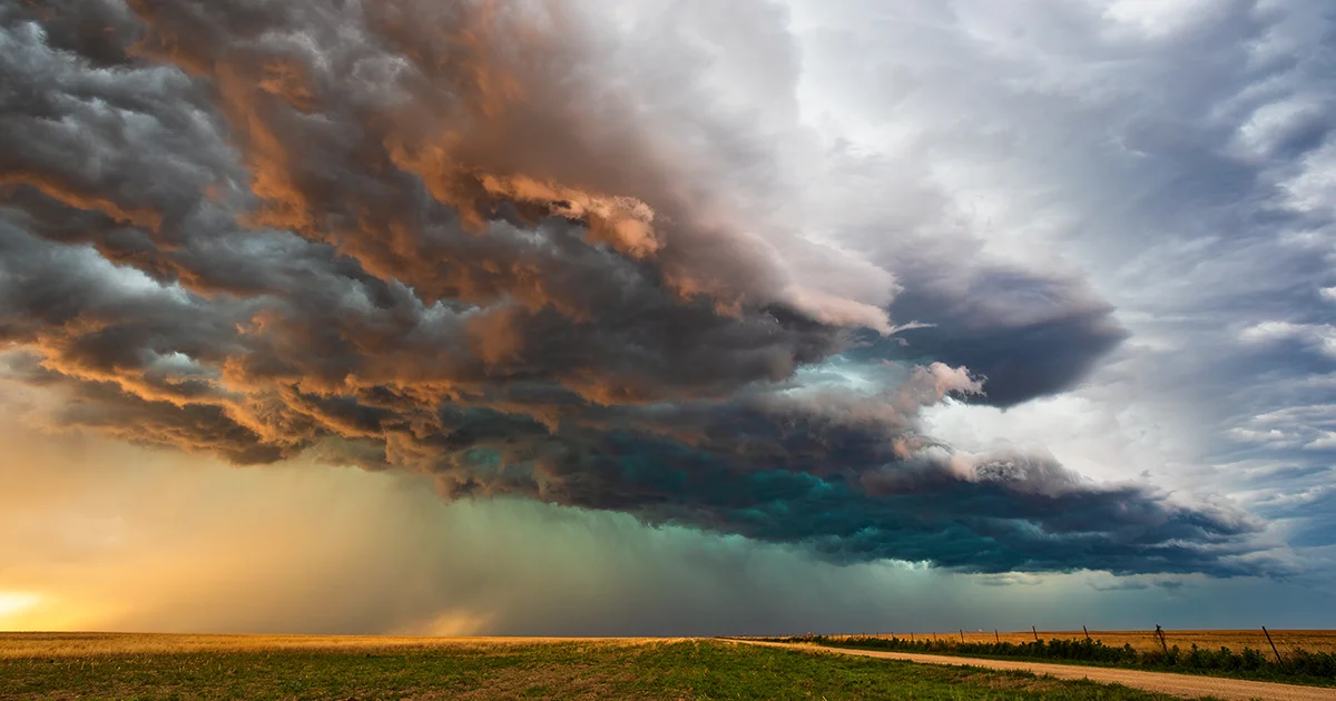A storm approaching a residential area.