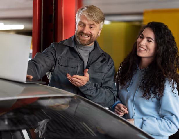 On-Site Tires employees checking car's parameters
