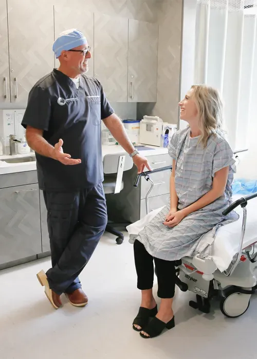 Dr. Daneshrad examining a patient