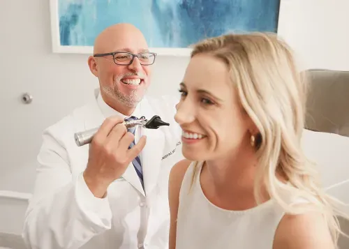 Dr. Daneshrad examining a patient